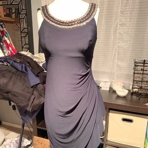 Navy jersey dress with jeweled neck